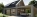 Einfamilienhaus mit Photovoltaikanlage, Carport mit Wallbox und Stromspeicher zum Aufladen des E-Autos.